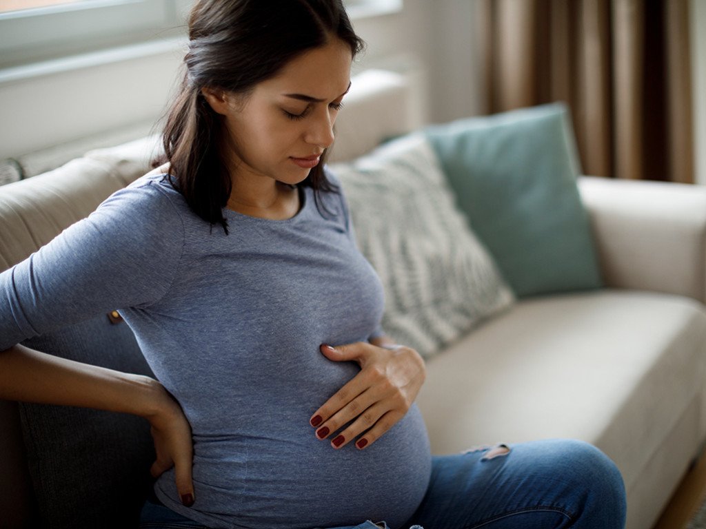 Understanding and Managing Back Pain in Pregnancy Causes, Symptoms
